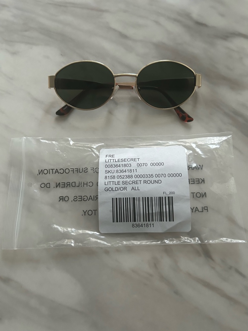 Free People Gold Oval Sunglasses with Dark Green Lenses
